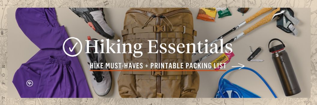 A laydown of hiking gear such as shoes, pack, jacket, poles, and water bottle. Text overlay reads: hiking essentials, hike must-haves + printable packing list.